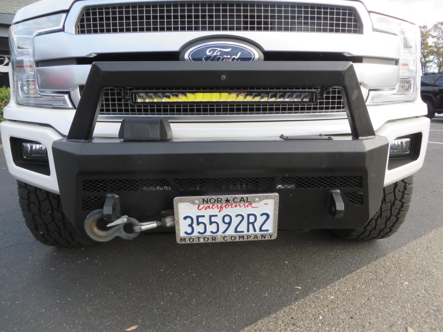 2019 White /BLACK INT W/DARK MARSALA LT Ford F-150 Platinum SuperCrew Cab 4WD (1FTEW1E45KF) with an 3.5L V6 ECOBOOST engine, 10-SPEED AUTO W/TOW MO transmission, located at 2630 Grass Valley Highway, Auburn, CA, 95603, (530) 508-5100, 38.937893, -121.095482 - F150 Platinum featuring a level kit, Fuel Offroad wheels, Toyo AT2 tires, Barricade Front winch bumper, Smittybilt winch, LED light bar, Undercover Ultraflex bedcover, and a Cargo Glide bed system. - Photo#9